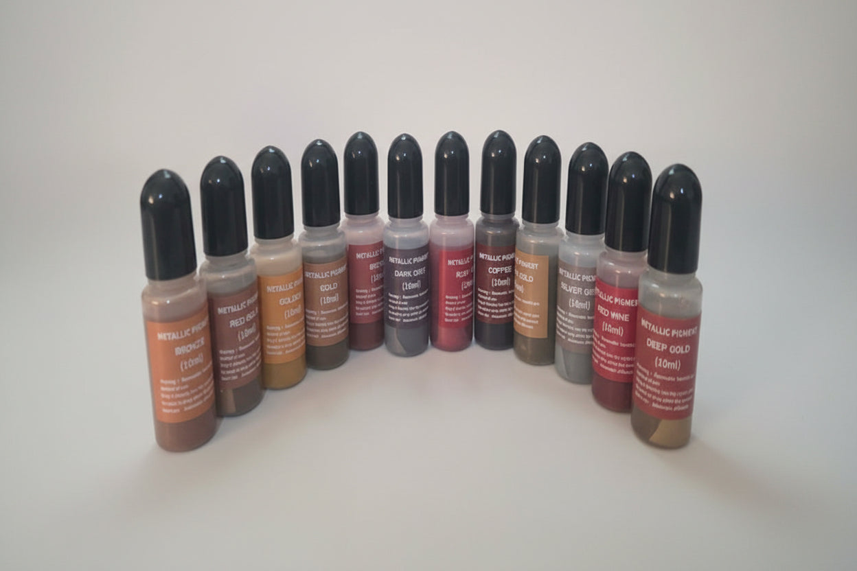 Set of 12 pearl metallic alcohol inks with labels on a white background