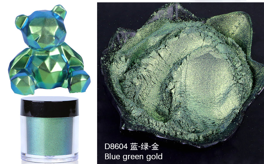 Crystal bear figurine and green powder with 'D8604 Blue Green Gold' label