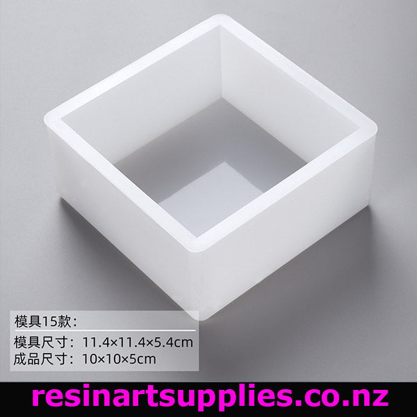White rectangular silicone mold on a gray background with text and brand name.