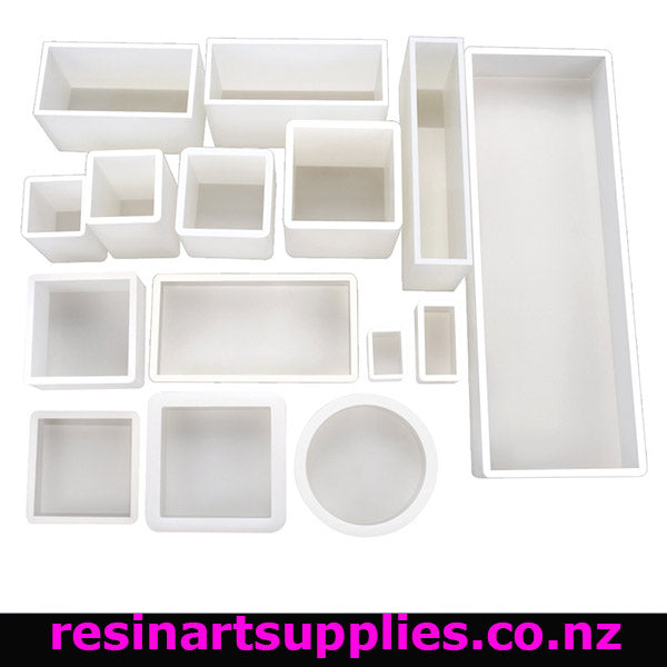 Set of various white silicone molds on a white background with 'resinartsupplies.co.nz' branding.