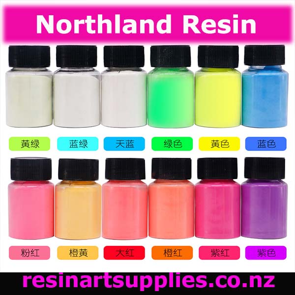 Set of resin bottles in various colors with Northland Resin branding.