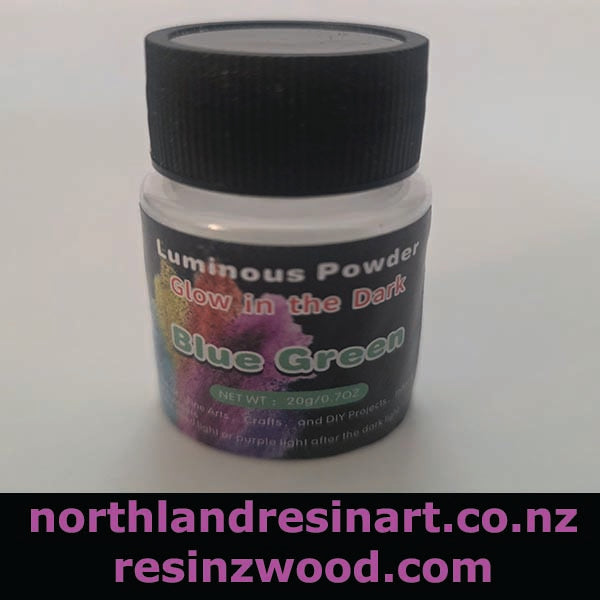 Bottle of luminous powder labeled 'Blue Green' with a black lid on a white background.