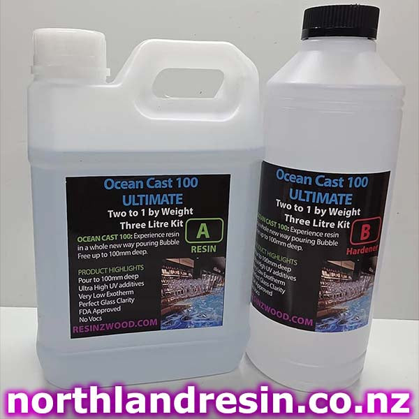 Two bottles of Ocean Cast 100 Ultimate resin kit with labels on a white background.