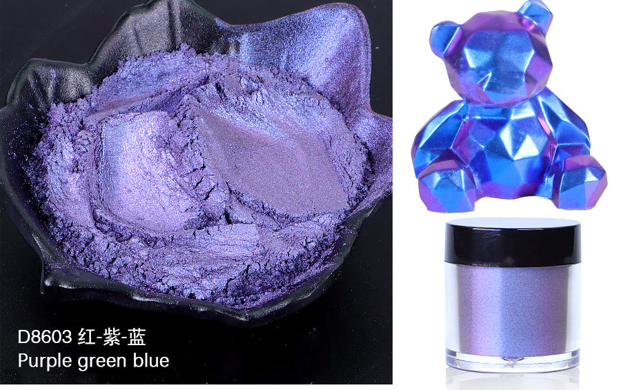Purple powder in a container with a colorful bear-shaped product on a black background