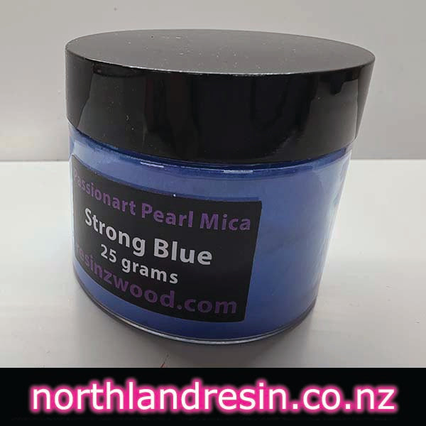 Blue container with black lid labelled 'Strong Blue' on a white background. Passionart brand mica powder