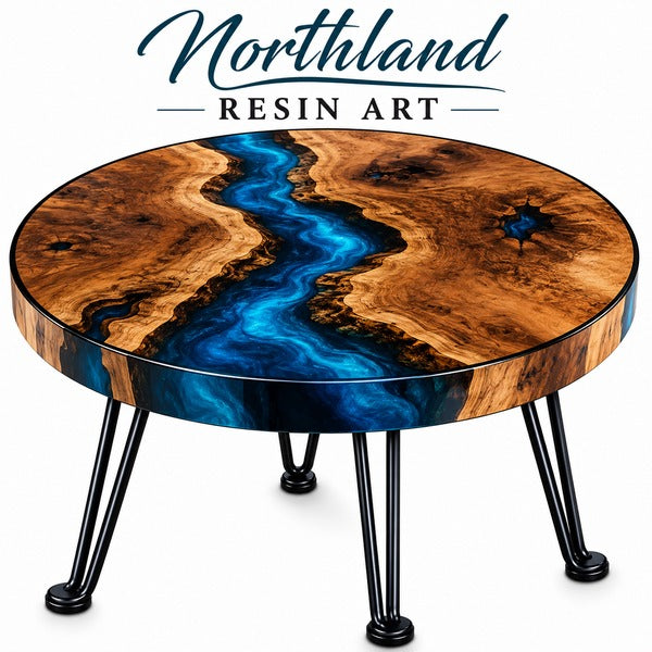 A round coffee table with a glossy resin top featuring a swirling blue river design over rich brown wood grain, supported by black hairpin legs. The brand logo 'Northland Resin Art' is displayed at the top of the image.
