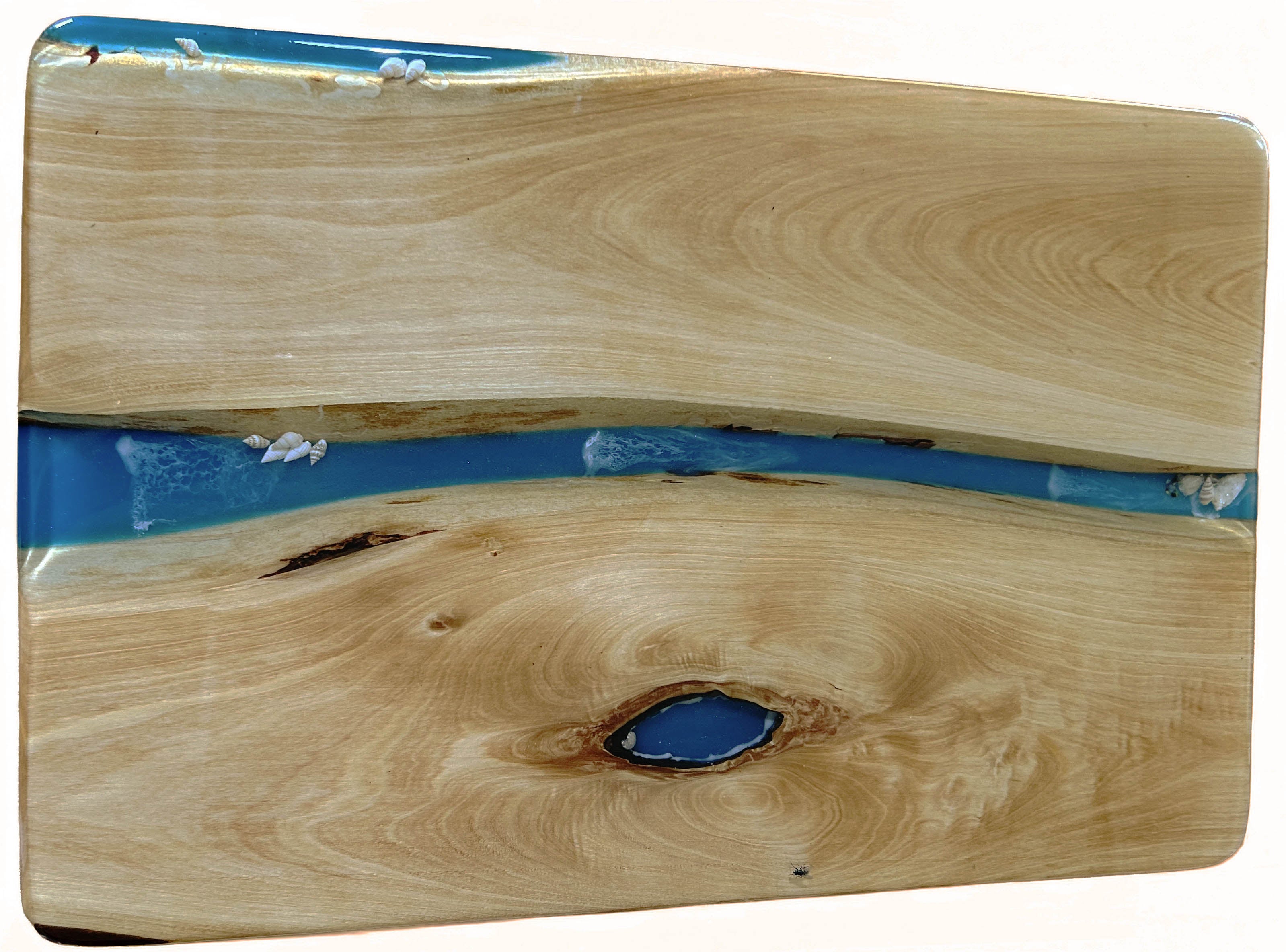 Wooden Coffee table with blue resin inlay on a white background