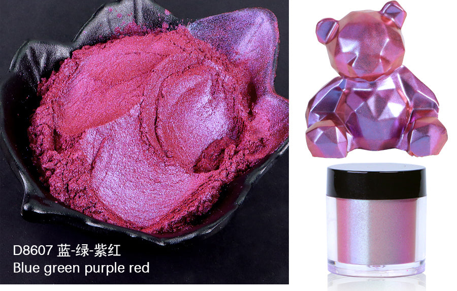 Purple powder in a black dish with a purple teddy bear and container on a black background