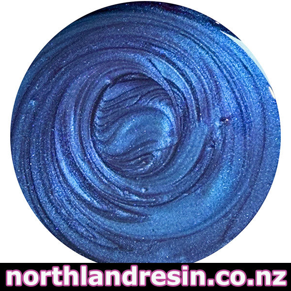Close-up of blue glittery resin with 'northlandresin.co.nz' logo at the bottom.