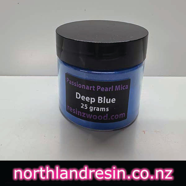 Blue container labeled 'Passionart Pearl Mica Deep Blue' with a black lid on a white background.
