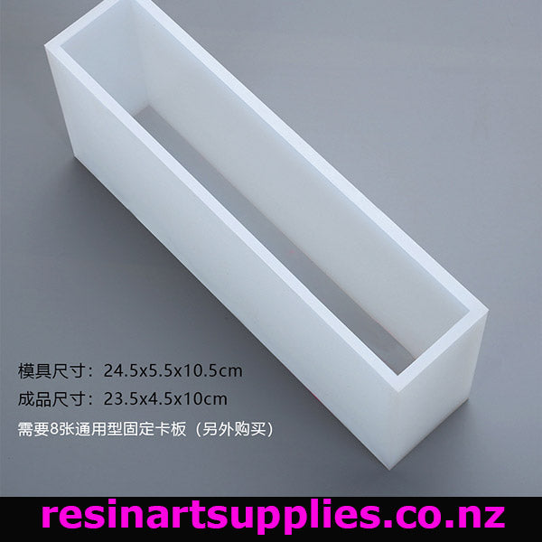Rectangular white plastic mold on a gray background with text and branding.