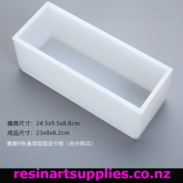 White rectangular silicone mold on a gray background with text and branding.