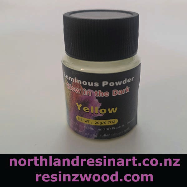 Bottle of luminous powder labeled 'Yellow Glow in the Dark' with a black lid on a white background.