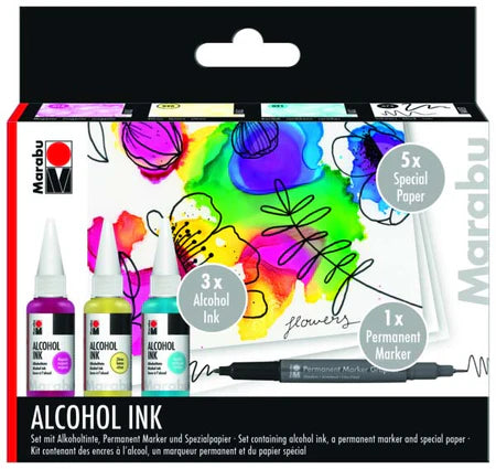 Marabu alcohol ink set with markers and paper on a black background