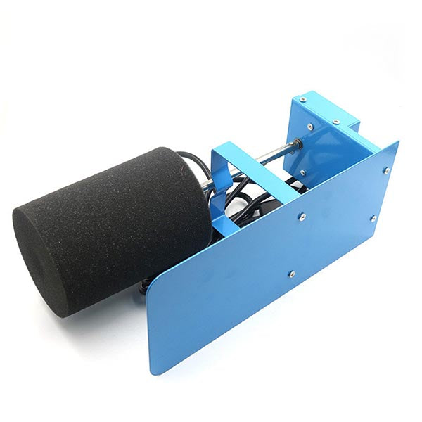 A blue metal foam Cup Turner attachment for a water slide or splash machine, featuring a black cylindrical foam head, blue mounting brackets, and visible internal springs and wires, set against a plain white background.