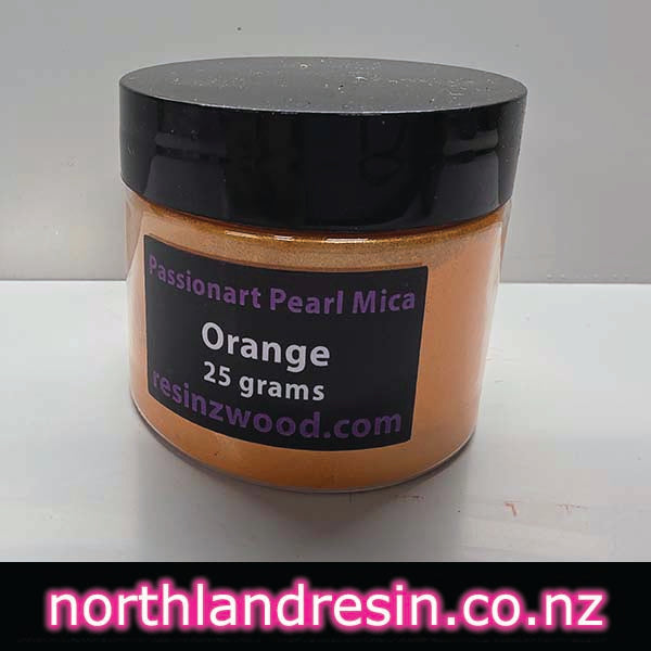 Jar of orange pearl mica with a black lid on a white background, featuring 'northlandresin.co.nz' text.