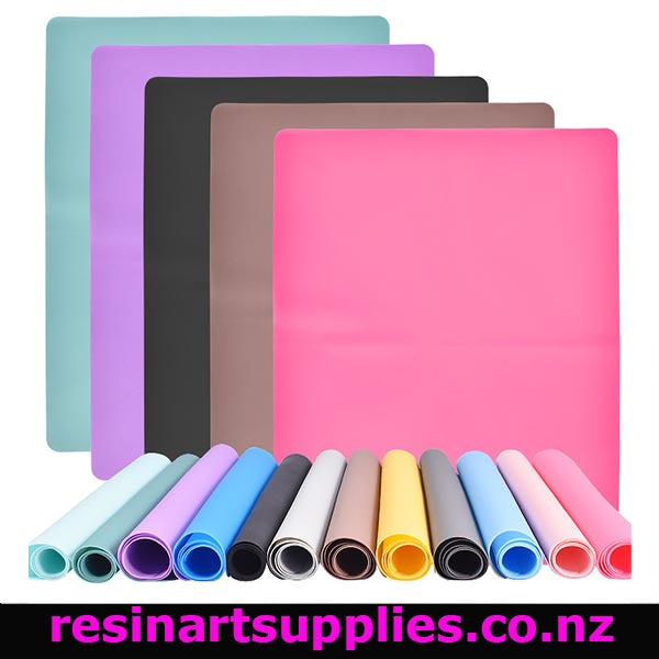 Set of colorful resin mats and rolls with 'resinartsupplies.co.nz' branding.