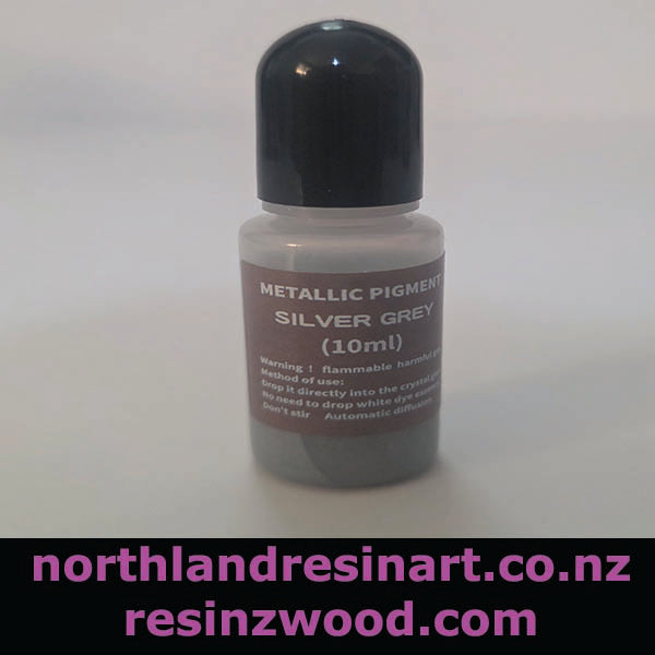 Bottle of metallic pigment labeled 'Silver Grey' on a white background with branding text at the bottom.