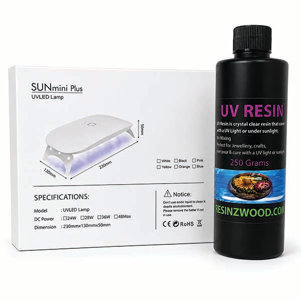 A bottle of UV resin alongside its product packaging box. The box is white with black text and a diagram of a UVLED lamp, while the bottle is black with a black cap and a label featuring purple and green text.