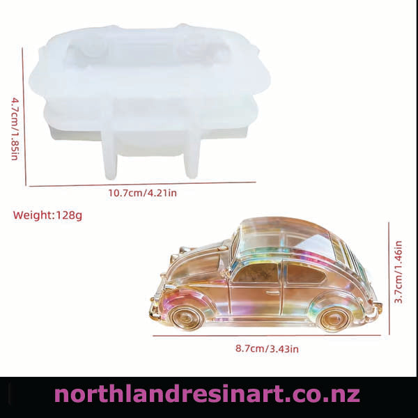 Iridescent car-shaped resin mold with dimensions and weight on a white background