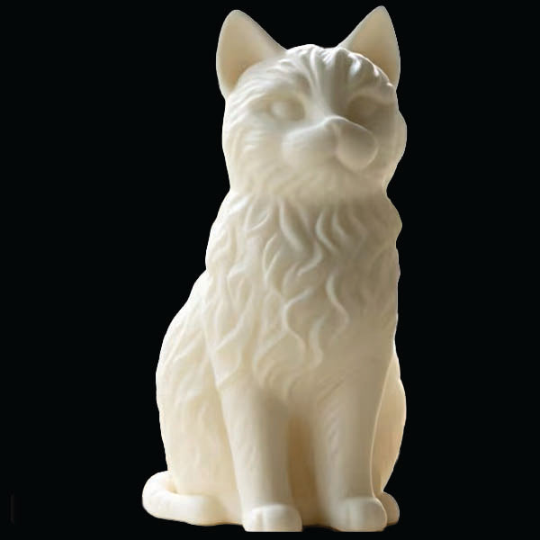 White Resin cat figurine on a black background