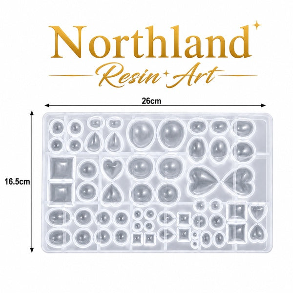 Silicone resin mould tray measuring 26cm x 16.5cm x 1.5cm, featuring assorted shapes including circles, hearts, teardrops, ovals and squares. Ideal for resin art, epoxy crafts, jewellery making and creative DIY projects. Northland Resin Art NZ.